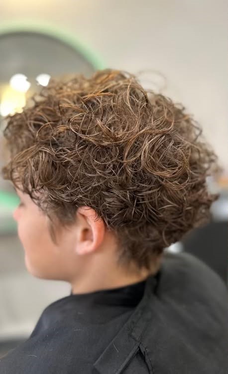 Beachy Curls with Subtle Blonde Highlights