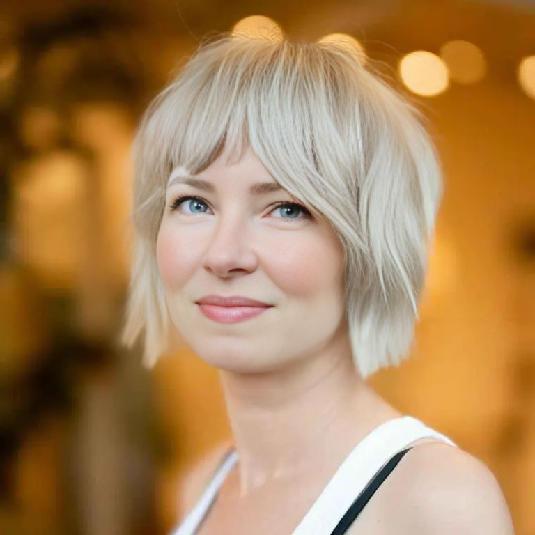 Bleached Blonde Shag Cut With Curtain Bangs