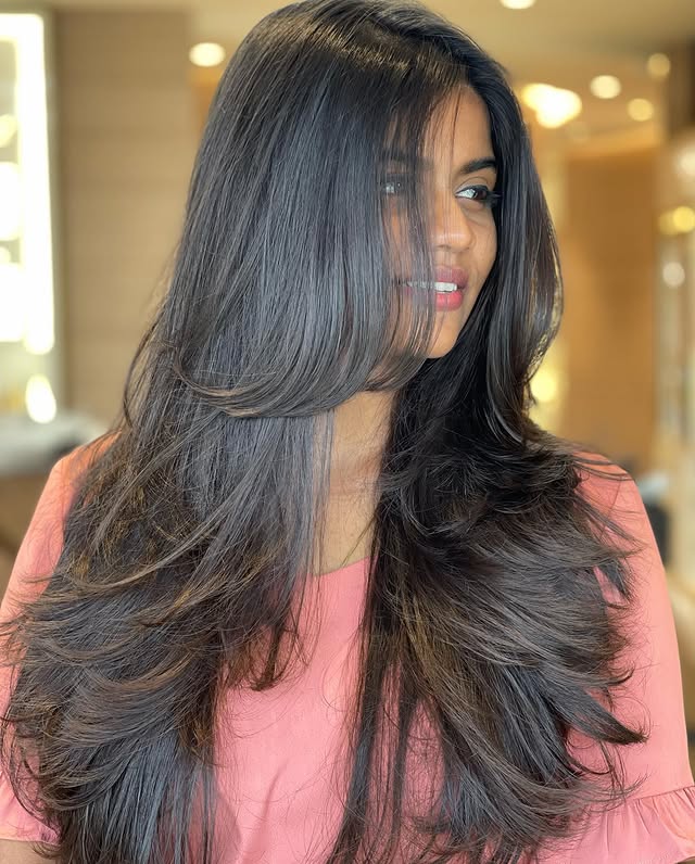 Chic Brunette Layers With Side-Swept Bangs