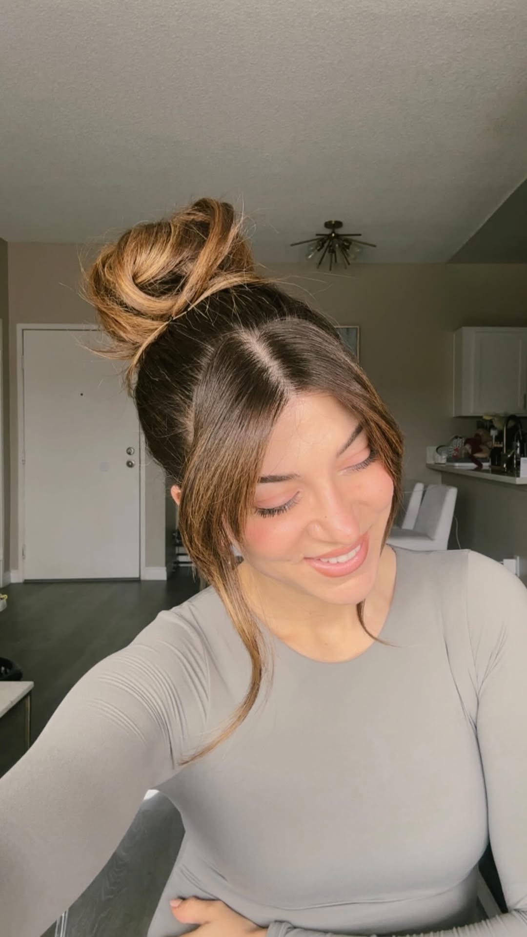 Chic Messy Updo With Curtain Bangs