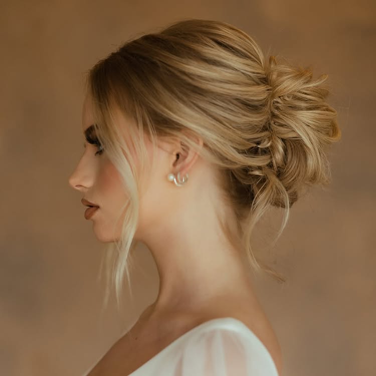 Elegant French Twist With Side-Swept Bangs