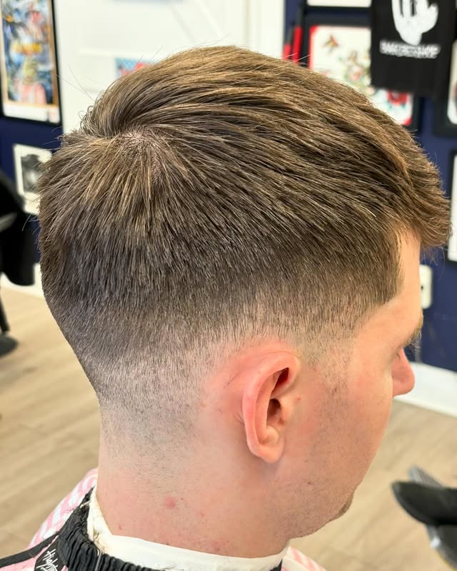 High Fade with Textured Sweep Back