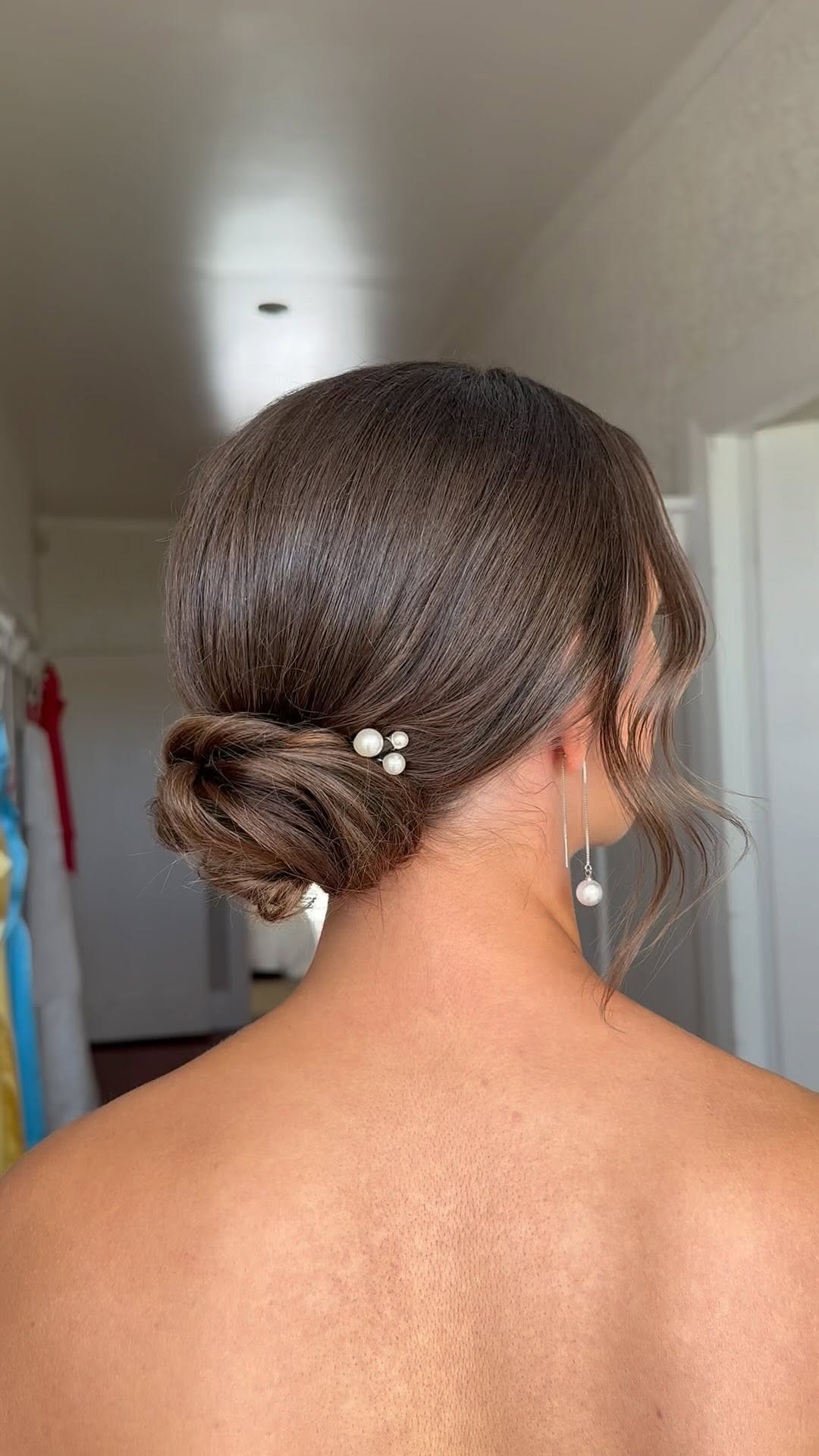 Triple Twisted Low Bun With Pearl Accents